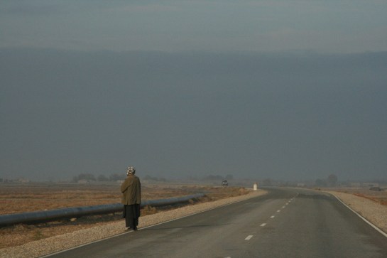 On the road, waiting for a lift. Early morning outside Mazar-e-Sharif