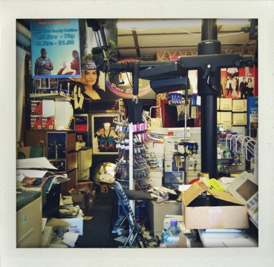 One of the many cluttered photo and framing shops in Brixton that survived the digital media